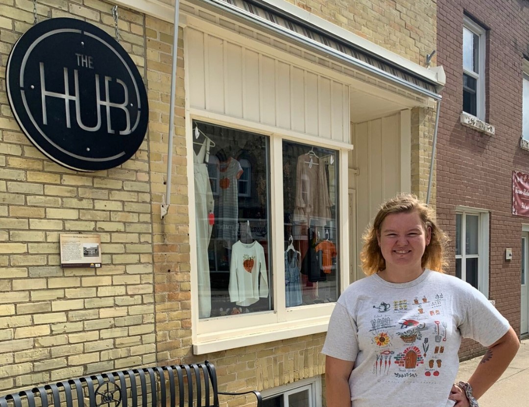 woman standing in front of store