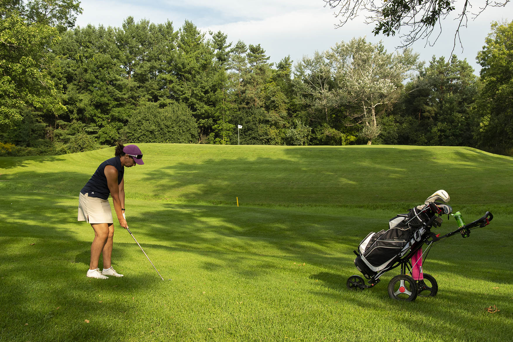 Woman golfing