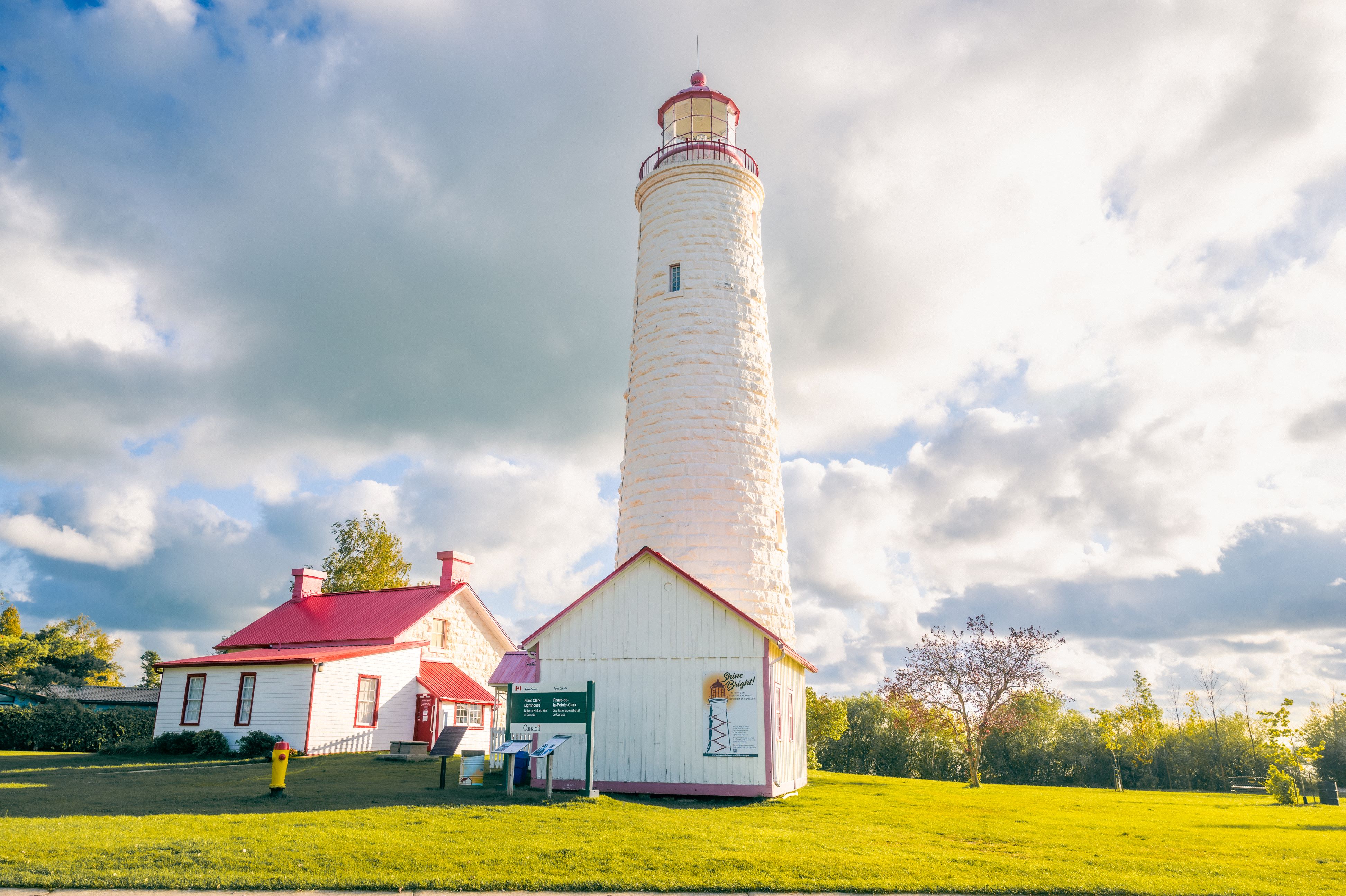 A tall white lighthouse on a sunny day