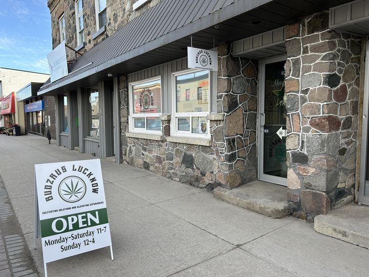 Budzrus sign outside downtown cannabis shop